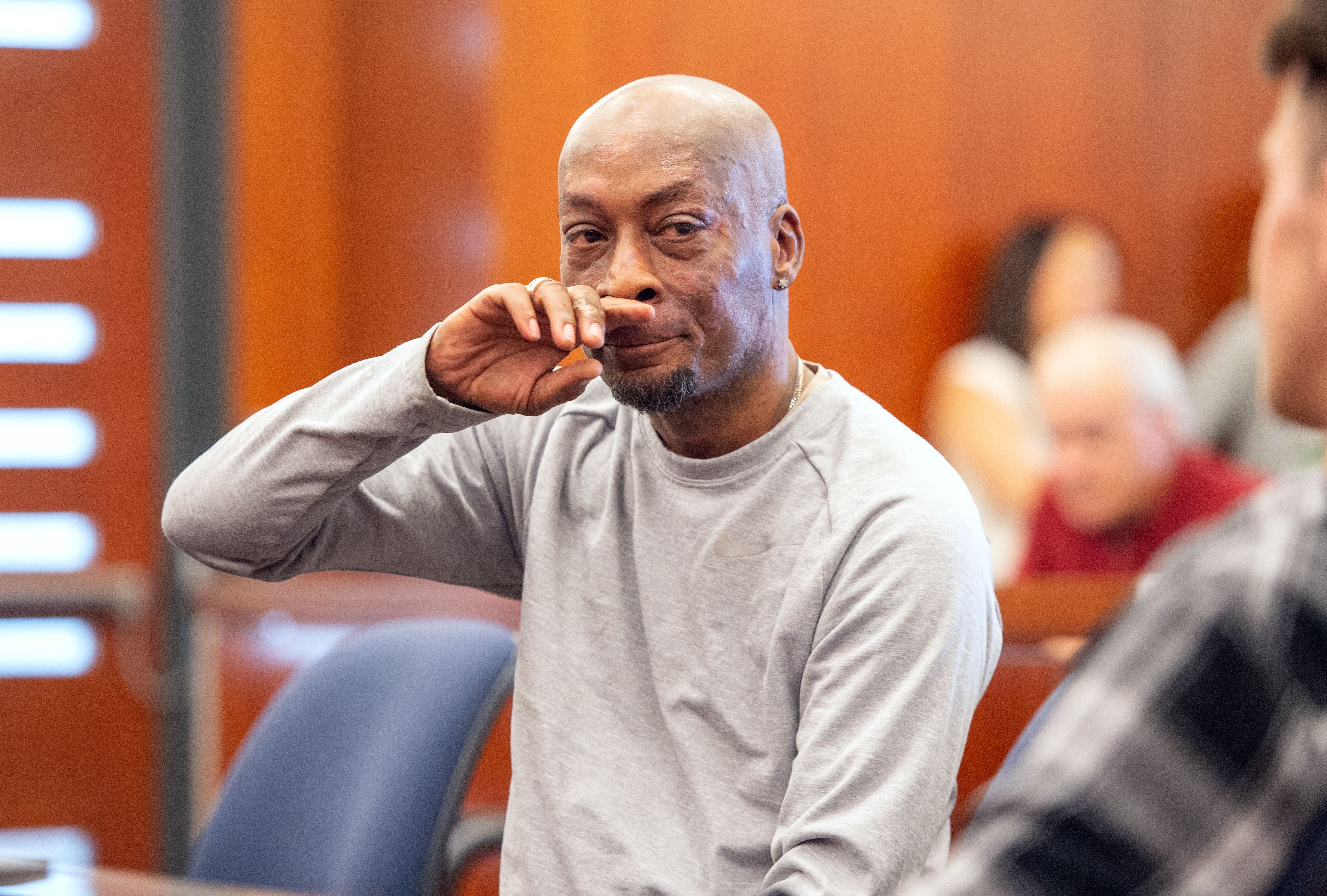 Dewayne Johnson reacts after the verdict was read in the case against Monsanto at the Superior Court Of California in San Francisco, California on August 10, 2018. - A California jury on Friday, August 10, 2018 ordered agrochemical giant Monsanto to pay nearly $290 million for failing to warn a dying groundskeeper that its weed killer Roundup might cause cancer. Jurors found Monsanto acted with "malice" and that its weed killers Roundup and the professional grade version RangerPro contributed "substantially" to Dewayne Johnson's terminal illness. (Photo by JOSH EDELSON / POOL / AFP)        (Photo credit should read JOSH EDELSON/AFP/Getty Images)