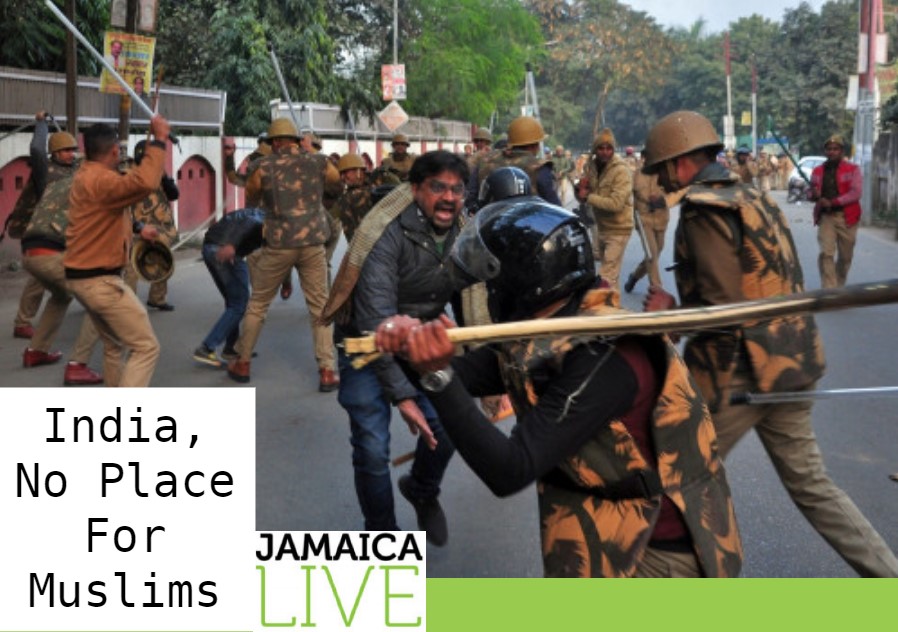 Police officers clashing with demonstrators protesting India’s new citizenship law (The Washington Post)