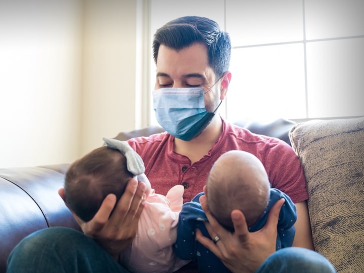 Father Vimay Verma with twins Corona and Covid