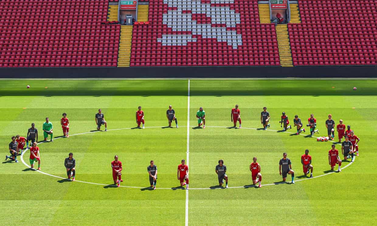 Liverpool players take a knee in memory of George Floyd at Anfield on Monday. Photograph: Andrew Powell/Liverpool FC/Getty Images