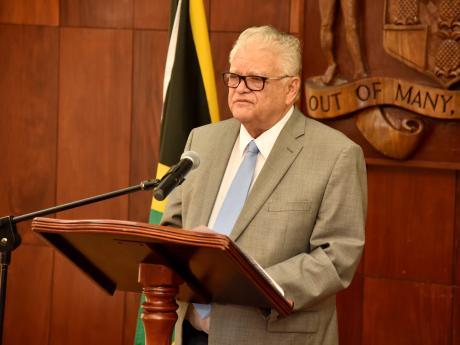 Honourable Karl George SAMUDA, CD, MP